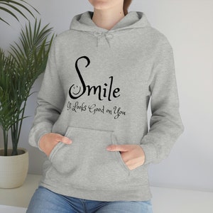 Smile it looks good on you Unisex Heavy Blend Hooded Sweatshirt