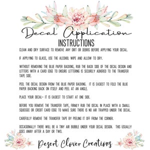 May include: Instructions for applying a decal. The instructions include cleaning the surface, removing the backing, and applying the decal. The text is written in black on a white background with a floral design at the top and bottom.