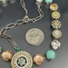 MARIANA NKLC-SLVR-BLUE & WHITE ROUND STONES main image 1