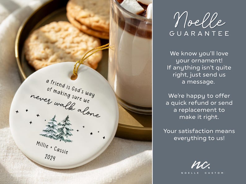 May include: A round white ceramic ornament featuring the text 'a friend is God's way of making sure we never walk alone', a graphic of two pine trees, small stars, the names 'Millie + Cassie', and the year '2024' printed in black ink.