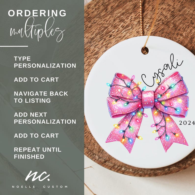 May include: A white ceramic ornament with a pink bow decorated with colorful lights. The ornament is personalized with the name "Cysali" and the year "2024".