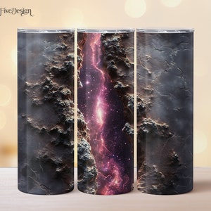May include: Three stainless steel insulated tumblers with a space-themed design. The center tumbler features a vibrant purple and pink galaxy, flanked by tumblers with a textured, dark gray and brown surface. The tumblers have a silver rim and lid.