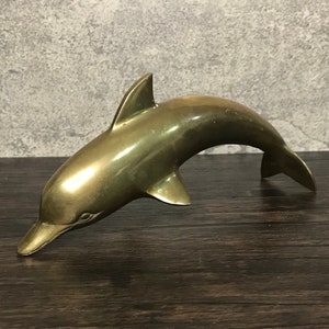 Vintage Leaping Dolphin Brass Figurine: Marine Decor