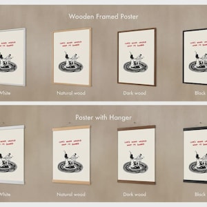 Pode incluir: Uma cole&ccedil;&atilde;o de oito cartazes com uma ilustra&ccedil;&atilde;o a preto e branco de duas pessoas a dan&ccedil;ar num disco de vinil com o texto vermelho "Love's never wasted when it's shared." Os cartazes s&atilde;o apresentados em molduras ou suportes brancos, de madeira natural, madeira escura e pretos.