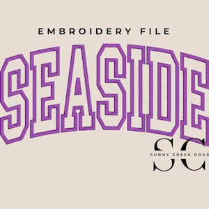 May include: An embroidery file design with the word "SEASIDE" in a purple, collegiate-style font, arched across the image. The text "EMBROIDERY FILE" is above the word "SEASIDE". Below the word "SEASIDE" is the text "Sunny Creek Road" and the letters "SC".