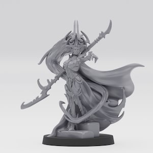 May include: A grey, detailed miniature figurine of a female figure with long, flowing hair, wearing a flowing cape and holding a long, curved weapon. The figure is standing on a round base.