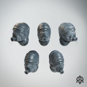 May include: Five gray, stylized, wrapped objects with a cylindrical protrusion on one side. The objects are arranged in a circular pattern against a white background. The objects have a textured, layered appearance.