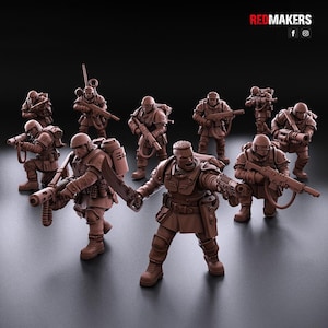 May include: A group of nine brown plastic miniature figures of soldiers, each holding a weapon. The figures are posed in various action stances, some with their weapons raised and others with their weapons lowered. The figures are all wearing helmets and armour, and some are wearing backpacks. The figures are all standing on a grey surface.