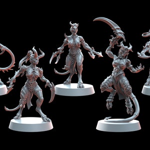 May include: Five gray painted miniature figurines of female demon characters with horns, tails, and weapons. The figures are posed in various action stances and are standing on round bases.