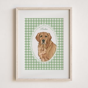 May include: A framed print featuring a golden retriever portrait within an oval frame, set against a green and white gingham background. The dog's name, "Marlow," is written above the portrait in cursive.