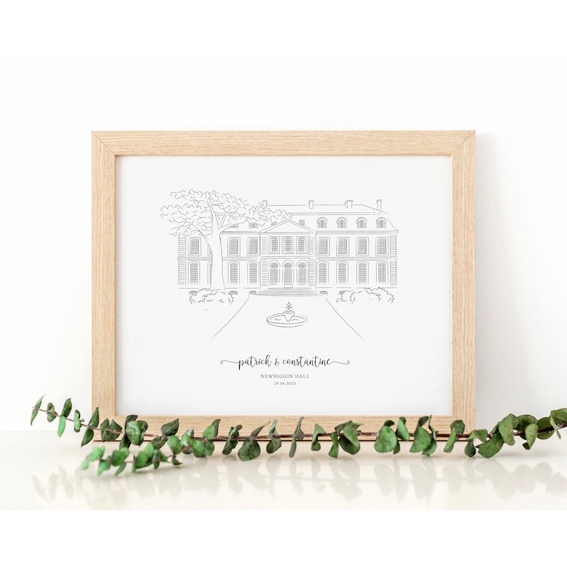 May include: A framed black and white line drawing of a stately building with a fountain and tree in front. The text "patrick & constantine" and "NEWBIGGIN HALL 29.04.2023" are below the drawing. The frame is light wood.
