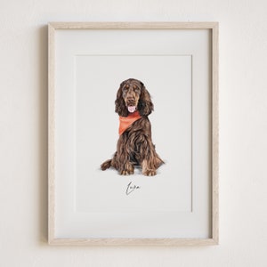 May include: A framed watercolor painting of a brown and white dog wearing a red bandana. The dog is sitting and looking at the camera. The painting is signed "Luna".