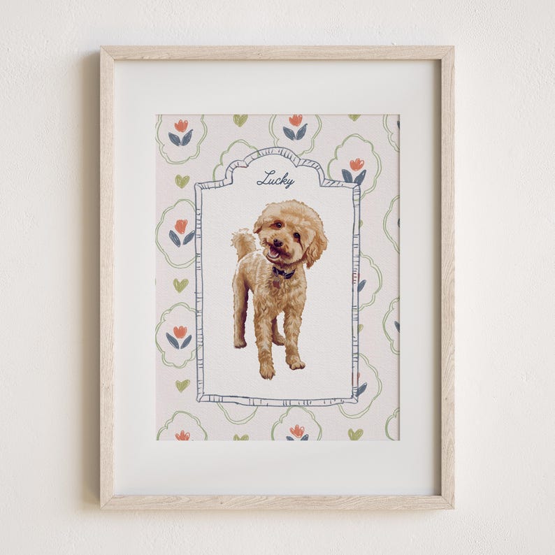 May include: A framed print featuring a tan poodle illustration. The dog is wearing a black collar and is centered within a decorative frame. The background has a floral pattern with the name "Lucky" above the dog.