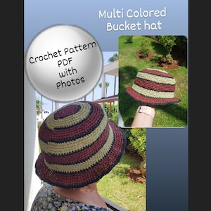May include: Crochet pattern PDF with photos for a multi-colored bucket hat. The hat is striped with brown, beige, and black yarn.