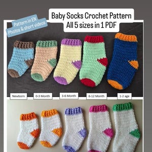 May include: A collection of colorful, crocheted baby socks in various sizes, including newborn, 0-3 months, 3-6 months, 6-12 months, and 1-2 years. The socks feature different color combinations, such as blue, green, yellow, and white, with contrasting cuffs and heels. The text "Baby Socks Crochet Pattern" is visible.