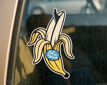 Pegatina de vinilo brillante "Come la ola" con forma de plátano para surfear.