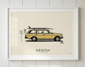 May include: A framed print featuring a yellow station wagon with a surfboard on top. The illustration includes a parking sign and the text "Eat the Wave" with the tagline "Where the ground gives up."