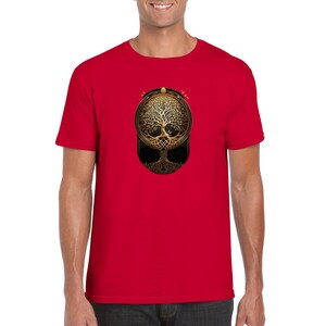 May include: A red t-shirt with a gold and black tree of life design. The tree is surrounded by a circle and has intricate details.