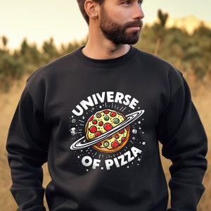 Universe of Pizza Planet Collection, Galactic Pizza Delight T-Shirt, Sweatshirt and hoddie, Cosmic Slice Apparel, Saturn-Style Pizzeria
