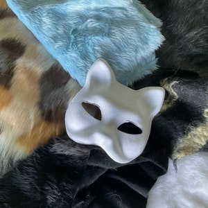 Here is a tutorial for a cat mask!! This is not just for therians but , how to make a therian mask