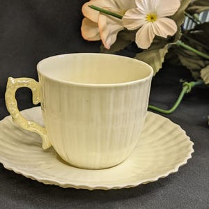 Belleek Dermitasse Porcelain Limpet Cup and Saucer. c1965-80
