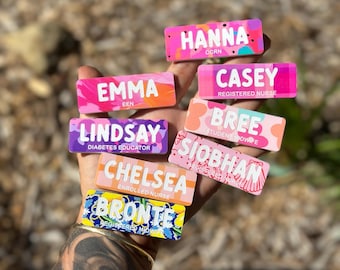 May include: Nine colorful name tags with different names and job titles. The names include Emma, Hanna, Casey, Bree, Lindsay, Siobhan, Chelsea, and Bronte. The job titles include Registered Nurse, Student Midwife, Diabetes Educator, Enrolled Nurse, and Registered Midwife.