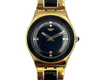 Swatch Irony Medium YELLOW PEARL BLACK YLG124G - black and gold stylish lady watch - 33 mm diameter