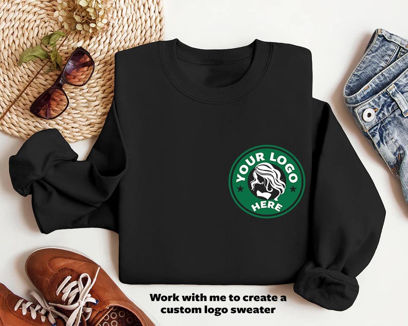 a black sweatshirt with a starbucks logo on it