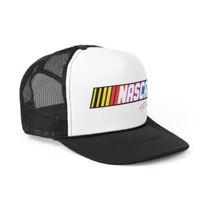 May include: A white and black trucker hat with a colorful NASCAR logo and the text "NASCAR Racing" on the front.