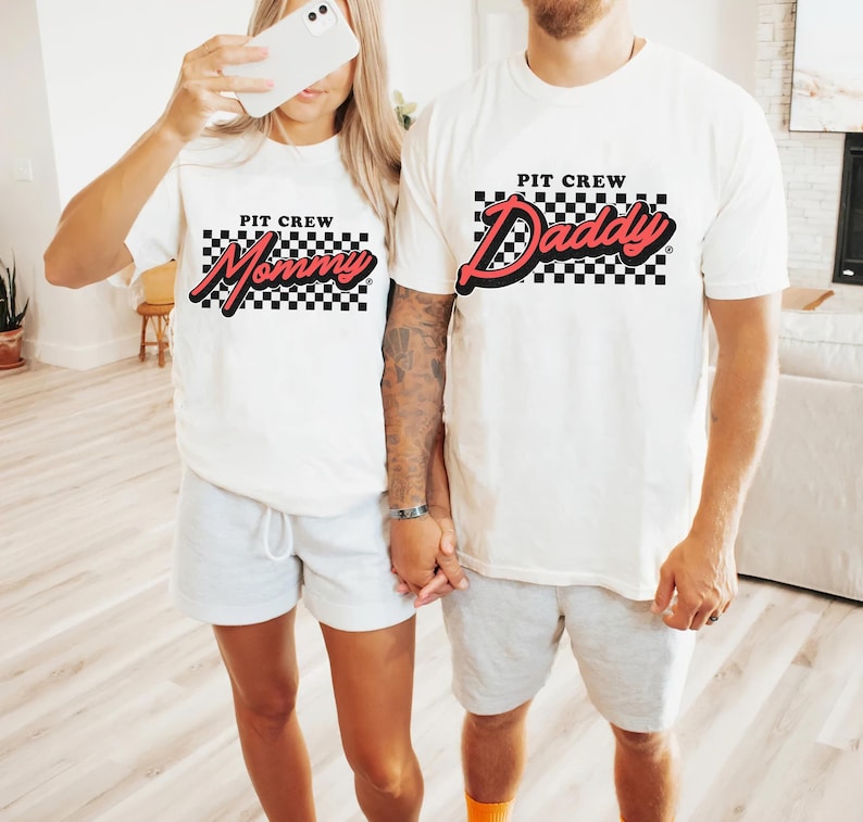 a man and a woman standing next to each other