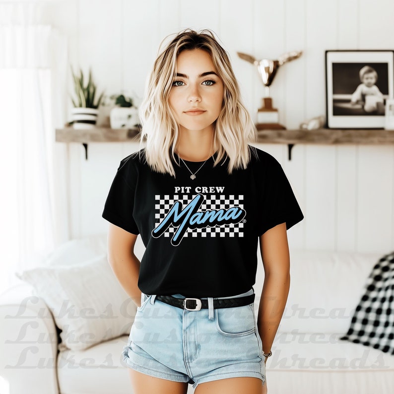 a woman wearing  birthday shirt saying pit crew