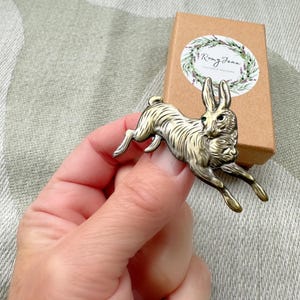 Brass Rabbit Brooch: Engraved Bunny with Green Crystal Eyes