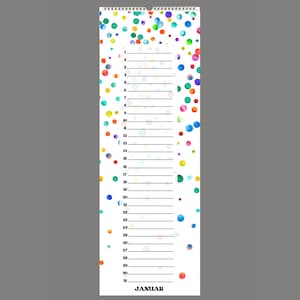 Può includere: Un calendario bianco con un motivo di coriandoli colorati. Il calendario è per gennaio e ha 31 giorni.