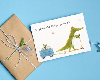 Geburtstagskarte - Geburtstagspost | Geburtstag | ein Krokodil fährt Roller | Postkarte oder Klappkarte | Aquarell