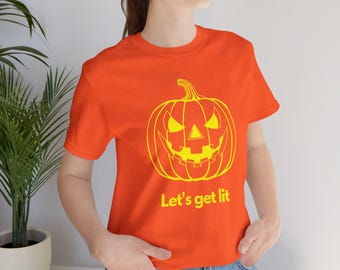 Camiseta gráfica divertida de Halloween: Camiseta de calabaza Let's Get Lit