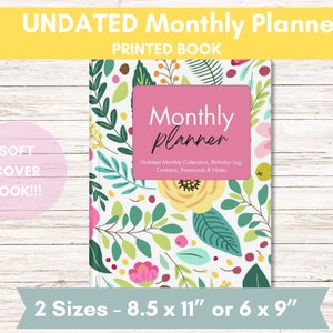 May include: A soft cover book with a floral design. The book is titled "Undated Monthly Planner" and has a pink and yellow floral pattern. The book is available in two sizes: 8.5 x 11 inches or 6 x 9 inches.