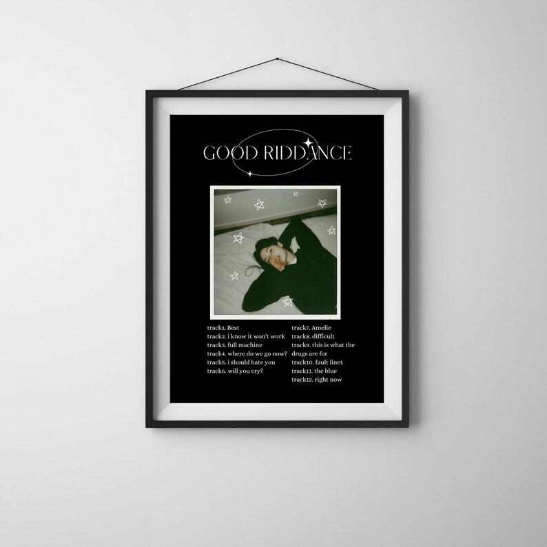 May include: A black and white photograph of a person lying on a bed with a white blanket. The photo is in a black frame with the words "GOOD RIDDANCE" in white text at the top. Below the photo is a list of song titles and track numbers.