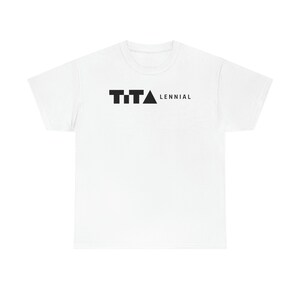 May include: White t-shirt with a black graphic of the text "TTA" and a triangle with the text "LENNIAL" below it.