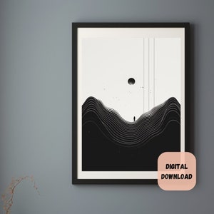 Pode incluir: Impressão de arte abstrata em preto e branco com um design minimalista que apresenta uma única figura em pé sobre uma série de linhas curvas. A impressão é emoldurada em preto e pendurada em uma parede cinza.
