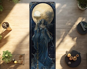 May include: A rectangular yoga mat featuring a central illustration of a figure in a flowing blue gown holding a tall, ornate staff topped with a glowing orb, set against a large full moon and a dark starry sky with decorative gold borders.
