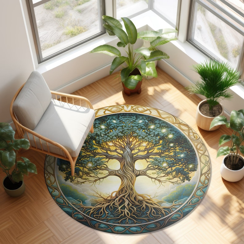 May include: A round rug with a circular design featuring a large, stylized tree with roots and branches. The tree is depicted in shades of green, brown, and gold, with a yellow background. The rug has a blue and gold border.
