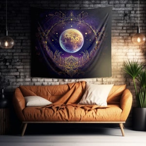 May include: A tapestry featuring a large, golden moon with a purple centre, surrounded by a detailed, gold mandala design against a dark blue background.