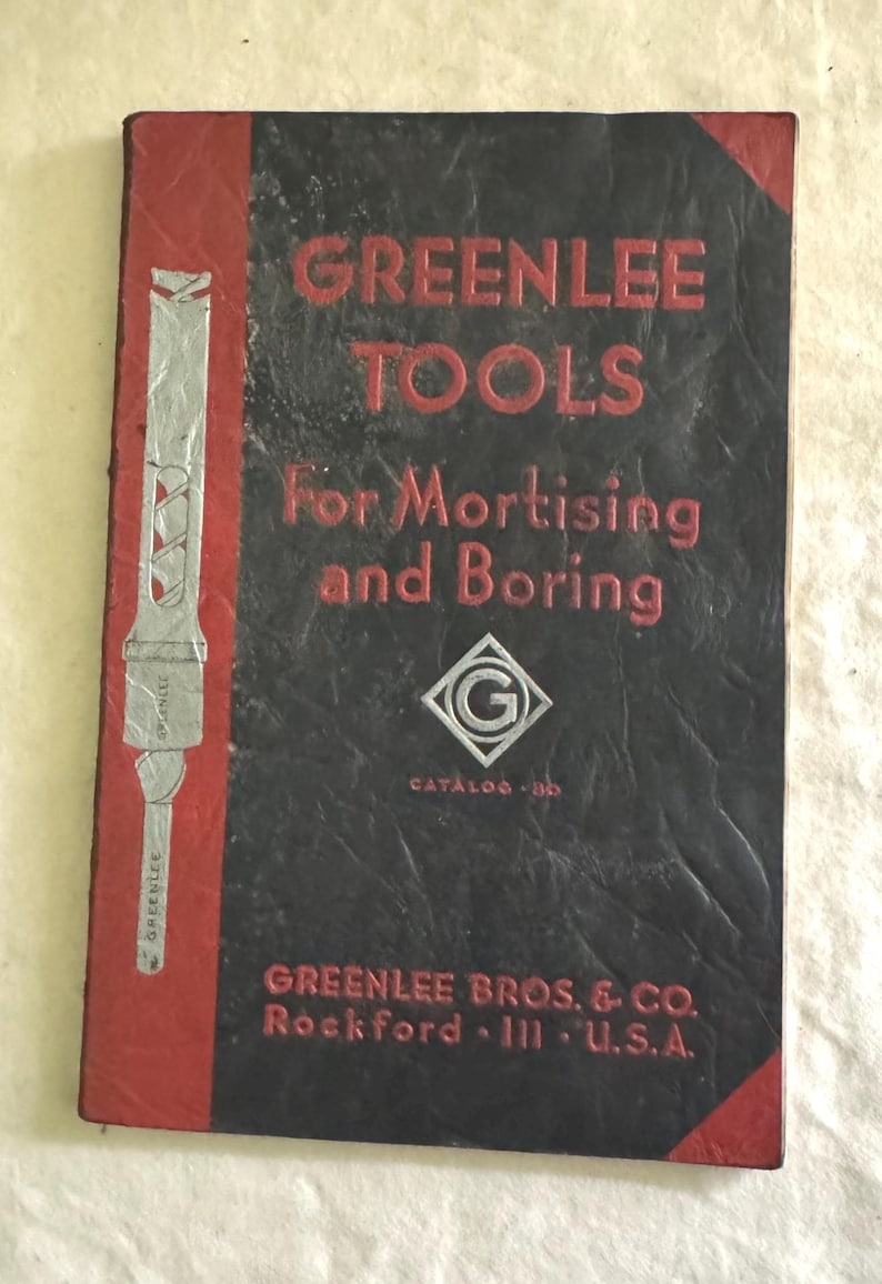 May include: Vintage Greenlee Tools catalog cover. The cover is black with red accents and features the text "GREENLEE TOOLS For Mortising and Boring." Includes a silver illustration of a tool and the company's name and location.