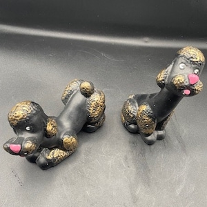 Mid Century Black chalkware/Ceramic Poodle with gold and pink noses