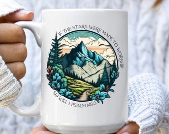 May include: White ceramic mug with a colorful illustration of a mountain landscape and the text "If the stars were made to worship so will I Psalm 148:3".