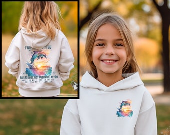 May include: A white hooded sweatshirt featuring a small colorful dolphin and sunset graphic on the front chest. The back displays a larger version of the same graphic with the text I WILL BE WITH YOU AND THE RIVERS WILL NOT OVERWHELM YOU.