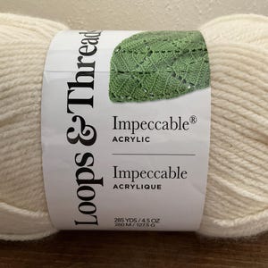 May include: A rustic wooden sign with the text "Welcome to our home" in white lettering. The sign features a distressed finish and a simple, inviting design, perfect for front door decor.