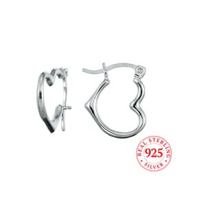 May include: A pair of silver heart-shaped hoop earrings. The earrings are made of sterling silver and have a polished finish.