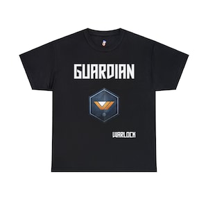 May include: Black t-shirt with the word "GUARDIAN" in white block letters above a geometric emblem with orange and blue accents. Below the emblem, the word "WARLOCK" is printed in white.