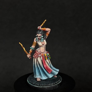 Female rogue miniature for Dungeons and Dragons